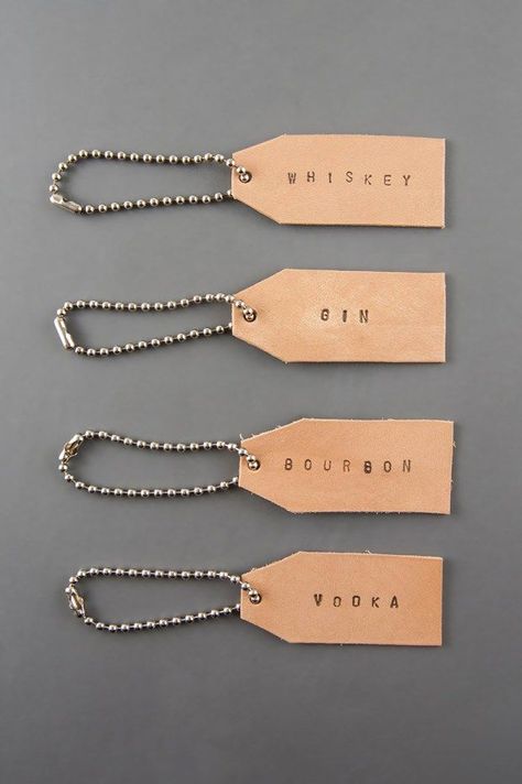 Leather tags: leather tags for clothing line, leather tags with company name or logo, leather key chains Diy Tags For Clothes, Leather Name Tag, Diy Leather Labels, Tags For Clothes, Tassen Hanger, Joululahjat Diy, Liquor Bottle Labels, Leather Tags, Sacs Tote Bags