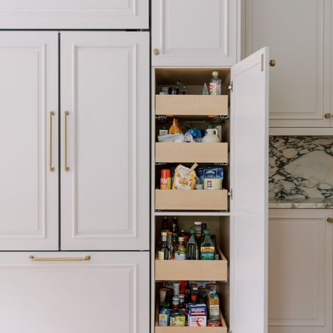 Tall cabinets with rollouts add a ton of storage to your kitchen. When installed next to your fridge they also create a nice built in look. This particular fridge is panelled and designed to be flush with the cabinets. But even a standard fridge looks better with some tall cabinets next to it. Fridge Cabinets Surround, Cabinets Beside Fridge, Fridge Flush With Cabinets, Fridge Panel Cabinet, Fridge Cabinet Surround, Kitchen Layout Plans, Tall Cabinet, Kitchen Layout, Kitchen And Bath