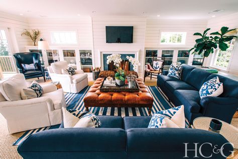 beach style living room with navy blue sofas, blue and white striped rug, square… Living Room Blue Sofa, Navy Blue Sofas, Modern Sectional Living Room, Beach Style Living Room, Living Room Blue, Dream House Living Room, Room Blue, Small Room Decor, Blue Sofa