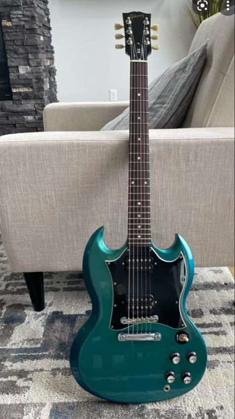 Teal Guitar, Sg Guitar, Electric Guitar Design, Guitar Obsession, Cool Electric Guitars, Gibson Sg, Guitar Gear, Guitar Art, Cool Knives