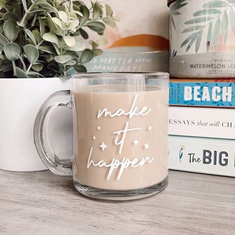 Make It Happen | Clear Mug * 13 ounce clear glass mug * White permanent and premium outdoor vinyl * Hand wash and dry Clear Mug Cricut Ideas, Clear Mug Design, Aesthetic Coffee Mugs, Clear Mugs With Vinyl, Glass Mugs With Vinyl, Clear Mugs, Silhouette Cameo Projects Beginner, Clear Mug, Clear Glass Coffee Mugs