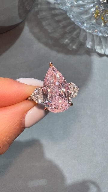 Pear Engagement Ring Pink Diamond, Pear Pink Diamond Ring, Pink Pear Shaped Engagement Rings, Pink Pear Ring, Pink Pear Engagement Ring, Pink Diamond Engagement Rings, Pink Diamond Ring Engagement, Pink Pear Diamond Ring, Engagement Rings Pink Diamond