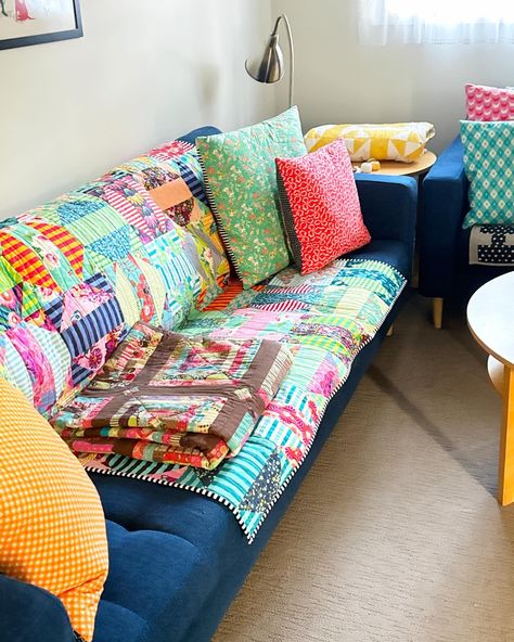 A quilter definitely lives here. The not so subtle hints are everywhere! I ended up covering the couches with quilts as 2 cats and a 5 year old are not kind to a fabric couch. I think I like this better anyway. So much colour and warmth. Do you have a lounge room full of quilts too? #emmajeanjansen #emmajeanjansenpattern #quilts #patchworkquilts #quiltsofinstagram #decoratingwithquilts #quiltsonthecouch Fabric Couch, 2 Cats, Couch Fabric, Lounge Room, Patchwork Quilts, Instagram A, Year Old, Lounge, Couch