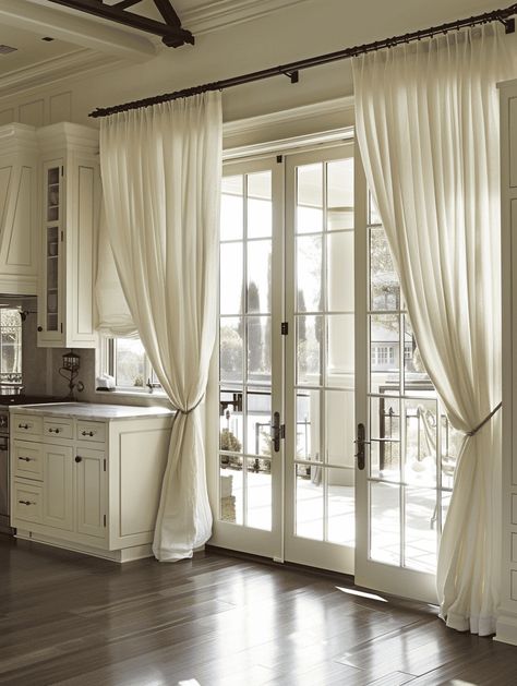 Should French Doors Have Curtains [And How To Install Them]? Curtains French Doors Kitchen, Interior French Door Curtains, Farmhouse French Doors Curtains, Curtains On Doors With Windows, French Doors Patio Farmhouse, French Doors Kitchen To Patio, Bedroom French Door Curtain Ideas, Bedroom With French Doors To Patio, Window Treatments For Patio Doors