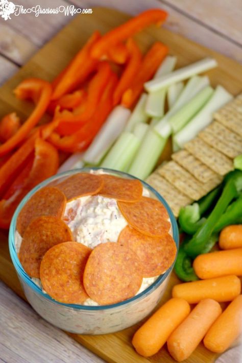 Italian Veggie Dip Recipe - an easy cold dip recipe with cream cheese.  Italian Veggie Dip is a cool, creamy, and fresh Italian veggie dip packed with pepperoni, cheese, and lots of flavor. Serve with an assortment of colorful veggies. This is so amazing with fresh vegetables or crackers! Perfect for a party! Veg Dip, Veggie Dip Recipe, Vegetable Dip Recipe, Recipes Dips, Dips Appetizers, Cold Dip, Cold Dip Recipes, Poolside Snacks, Tiny Bites