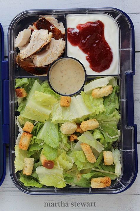 A Caesar salad is a tasty bento box option that's fun to pack. Pack lettuce, cheese, and croutons in the largest section of the lunch box and put the dressing in a sealed container on the side to add at lunchtime. Add a serving of sliced rotisserie chicken and yogurt with a dollop of jam to round out lunch. #marthastewart #recipes #recipeideas #lunchideas #lunchrecipes #kidrecipes Salad Bento Lunchbox Ideas, Bento Box Salad, Bento Salad, Salad Bento, Salad Lunch Box, Healthy After School Snacks, Lunch Ideas Kids, Bento Box Lunch Ideas, Box Lunch Ideas