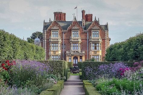 [b]Sandringham House[/b] Originally purchased in 1863 by King Edward VII and Queen Alexandra, the Queen’s much-loved Norfolk home boasts 25 hectares of gardens. The formal enclosed gardens were created by Geoffrey Jelicoe in 1947 for King George VI and are planted in a cottage garden style, best seen in late July when it is home to many bees and butterflies. In the late 1960’s Her Majesty asked Sir Eric Savill to re-landscape the Woodland Garden to make it more sheltered and private. To do so, Frogmore House, Cottage Garden Style, Sandringham House, Buckingham Palace Gardens, Norfolk House, Queen Summer, London Residence, Sandringham Estate, Annual Garden