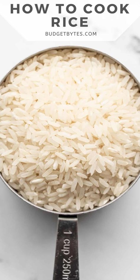 A simple step by step guide on how to cook rice on the stove top, with tips, tricks, and answers to all of your rice questions. BudgetBytes.com Rice Stove Top, Rice On The Stove Top, Long Grain Brown Rice, Rice On The Stove, Cook Rice, Budget Bytes, Biscuit Rolls, Cup Of Rice, Long Grain Rice