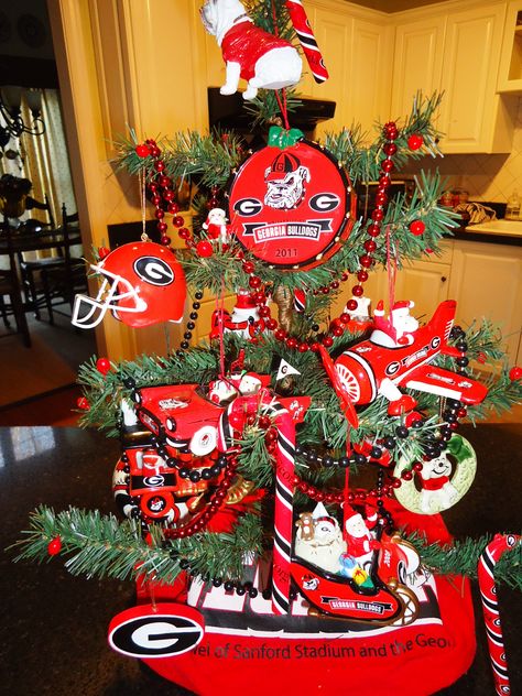 My UGA Christmas Tree!  I need a bigger tree. Ga Bulldawgs Christmas Tree, Uga Christmas Tree, Atlanta Braves Christmas Tree, Football Christmas Tree, Georgia Bulldogs Decor, Georgia Bulldog Room, Georgia Bulldog Man Cave, Georgia Christmas, Football Christmas