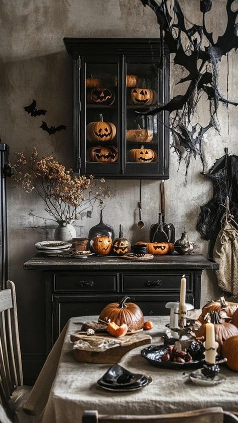 Create a bewitching kitchen atmosphere with Halloween decor that enchants and inspires. Arrange apothecary jars filled with colorful candy, display crow-themed salt and pepper shakers, and drape spider web table runners across surfaces. Hang wreath made of miniature pumpkins and gourds on the pantry door. Let your kitchen become a cauldron of creativity, where Halloween spirit simmers alongside your culinary adventures. Halloween Kitchen Island Decor, Apothecary Halloween Decor, Moody Halloween, Girl Craft, Pumpkins And Gourds, Halloween Kitchen Decor, Halloween Mantle, Halloween Party Dinner, Autumn Dining