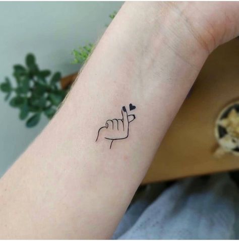 Snapping Fingers Tattoo, Korean Finger Heart Tattoo, Mini Wrist Tattoos For Women, Korean Heart Tattoo, Boys Tattoo Hand, Finger Heart Tattoo, Heartless Tattoo, Henna Designs Wrist, Middle Finger Tattoos