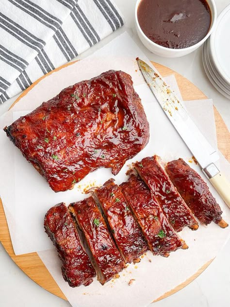 are perfectly fork tender and succulent, slathered in a rich and zesty Dr. Pepper barbecue sauce. Delicious and easy recipe for slow cooker ribs -- perfect for game day, summer BBQs, and family get togethers. Did you know you can make tender, juicy ribs with the most amazing flavor right in your slow cooker?These slow cooker Dr. Pepper BBQ ribs are seasoned with a flavorful rib dry rub recipe, brushed with BBQ sauce, and cooked low and slow in Dr. Pepper.But that's not all.The ribs a… Dr Pepper Bbq Ribs, Crock Pot Ribs, St Louis Ribs, Slow Cooked Ribs, Slow Cooker Baked Beans, Cream Cheese Chicken Chili, Crockpot Ribs, Slow Cooker Baking, Dry Rub Recipes