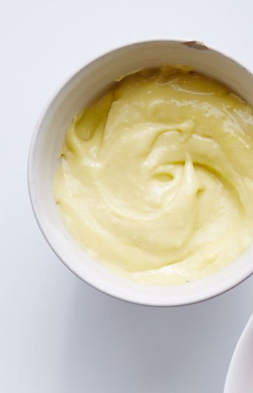 Real-Deal Aioli recipe: Whisk egg yolk, garlic, and salt in a medium bowl to combine. Mix in 1 tsp. water. Whisking constantly, add oil, drop by drop at first, then ⅛-teaspoonful at a time as mixture emulsifies and thickens. (Do not add oil too quickly or aioli will break and oil will separate.) Whisk until oil is incorporated and aioli is stiff enough to hold its shape when spooned. How To Make Pastry, Garlic Aioli Recipe, Pastry Cream Recipe, Aioli Recipe, Garlic Aioli, Pastry Cream, Tapenade, It Goes On, Aioli