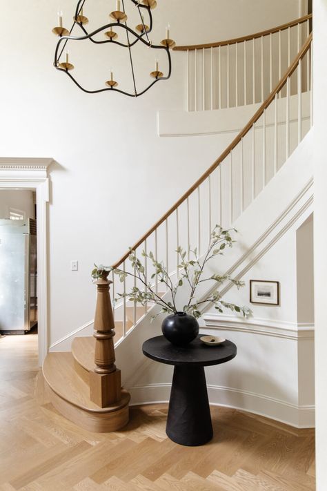 A Fresh Look at the Entry - Chris Loves Julia Round Entry Table, Stair Nook, تحت الدرج, Front Stairs, Huge Mirror, Escalier Design, Black Front Doors, Chris Loves Julia, Foyer Table