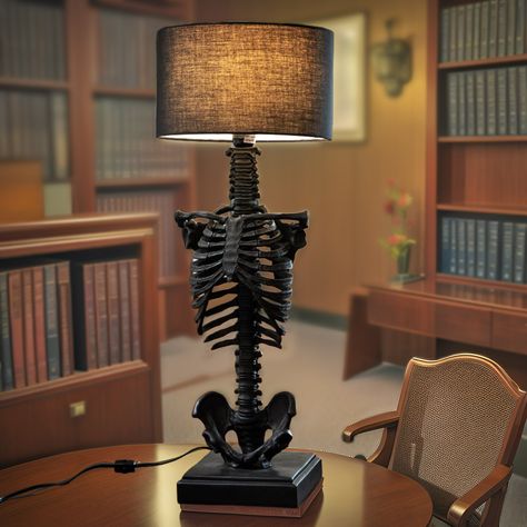 Which gothic table lamp is your favorite? 🌙💀 1. Full Skeleton Lamp - Make a bold statement with this unique piece that combines eerie elegance and striking design. 2. Tall Vertebrae Spine Lamp - Elevate your space with this towering, intricately detailed lamp perfect for adding a dramatic touch. 3. Compact Vertebrae Spine Lamp - Perfect for desks or small tables, this lamp offers a blend of gothic charm and functionality. All three lamps are now available at GothicPlus.com! Enhance your hom... Skeleton Table, Skeleton Lamp, Gothic Lamp, Goth Apartment, Halloween Lamp, Lamp With Black Shade, Gothic Table, Lamp Standing, Trick Or Treat Studios