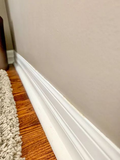 Get ahead of spring cleaning checklist and learn how to quickly and easily clean baseboards and door. #howtoclean #springcleaning Clean Baseboards, Cleaning Baseboards, Cleaning Paint Brushes, Powder Laundry Detergent, Stained Doors, Homemade Cleaners, Toilet Bowl Brush, Floor Trim, Spring Cleaning Checklist