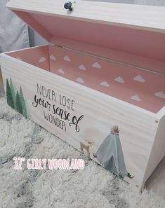 "DESCRIPTION: This 24\" rolling toy box or a 32\" Large toy chest. That can read \"Be brave little one\" or \"Never lose your sense of wonder. The toy box is hand crafted & It has a handpainted tent, deer and teppee and white polka dots on the front, and white clouds on the inside. (If you want the woodland design or the girly woodland design as they appear in the photos. Simply choose the ome you want from the drop down choices). Anything is customizable!! Just send me a message:) This is t Painted Toy Box Ideas, Personalized Toy Chest, Painted Toy Boxes, Large Toy Chest, Baby Toy Box, Boys Toy Box, Kids Toy Chest, Nature Themed Nursery, Childrens Toy Boxes