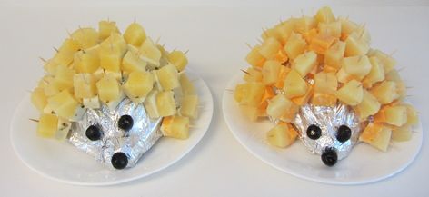 It's a British thing!  Cheese and Pineapple Hedgehogs (or Porcupines).  A cabbage cut in half, wrap in tin foil, add cheese and pineapple chunks on cocktail sticks for spines, olives for eyes and nose.    You can also use a potato for the body.  I used a mild cheese for one and a hot Mexican cheese for the other, fun for parties! Cheese and Pineapple go well together. Cheese And Pineapple Hedgehog, Pineapple Hedgehog, Duggee Party, Cheese And Pineapple, Gruffalo Party, Woodland Fairy Party, Hey Duggee, British Things, Bbq Ideas