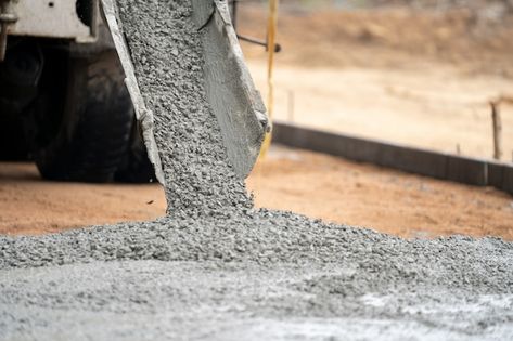 Photo a construction worker pouring a we... | Premium Photo #Freepik #photo #concrete-construction #contractor #concrete-mixer #building-site Exposed Aggregate Driveway, Aggregate Driveway, Concrete Calculator, Stamped Concrete Driveway, Ready Mixed Concrete, Concrete Truck, Exposed Aggregate, Types Of Concrete, Concrete Finishes