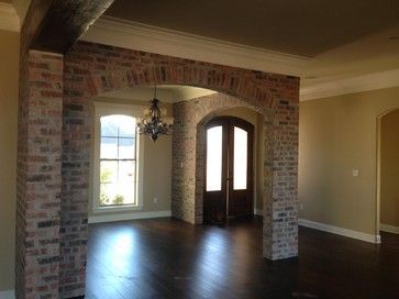 Madden home design, Tuscan style homes, House design Brick Arch With Wood Beam, Brick Columns Interior, Madden Home Design, Brick Arches, Columns Interior, Brick Ideas, Kim House, Brick Archway, Interior Brick