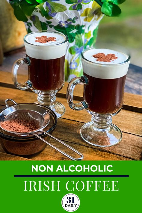 Synonymous with St. Patrick's Day, Irish Coffee is a sure sign of the season. These two Non-Alcoholic Irish Coffee recipes are festive and utterly delicious. And best of all -- can be served to anyone who loves coffee, shamrocks, and the Irish. #irishcoffee #mocktails #nonalcoholic #stpatricksday #irish #ireland #coffee #31Daily Scottish Drinks Non Alcoholic, Irish Drinks Non Alcoholic, Irish Coffee Bar, St Patrick’s Day Coffee Drinks, Coffee Mocktail Recipe, Victorian Restaurant, Christmas Drinks Alcohol Recipes, Irish Coffee Recipe, Christmas Drinks Recipes