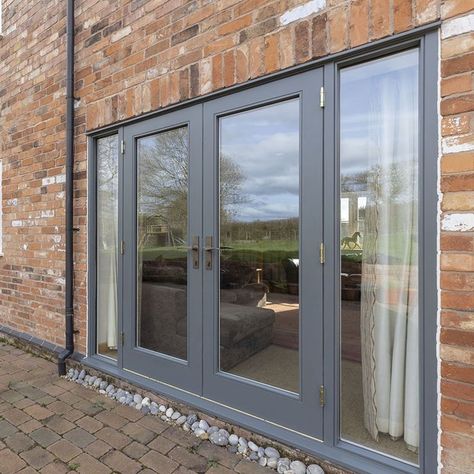 Dark grey wooden French doors Timber Patio, Dark House Exterior, French Doors To Deck, French Doors Living Room, French Doors Patio Exterior, New Door Design, Doors With Sidelights, Aluminium French Doors, Wooden French Doors