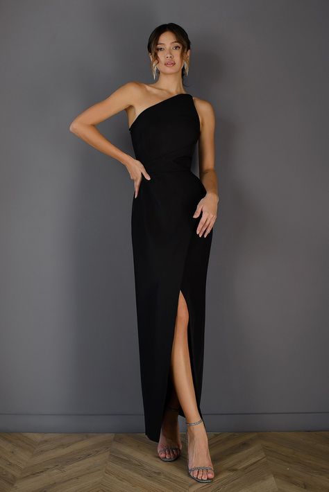 Enhance your fashion sense with ELAGIA's Black Asymmetric Sleeveless Maxi Dress, a blend of modern chic and classic elegance. Featuring an enticing asymmetrical design and a sleeveless silhouette, this dress exudes effortless sophistication, perfect for making a bold statement at upscale occasions. #blacksleevelessdress #asymmetricstyle #modernchic #elegantensemble #eveningattire #womensfashion #boldstatement #maxidressstyle Shawl Lapel Suit, Black Gala Dress, Black Tie Dress Wedding, Wedding Guest Dress Inspiration, Black Tie Wedding Guest Dress, Gala Outfit, White Shawl, Zipper Lock, Black Tie Wedding Guests