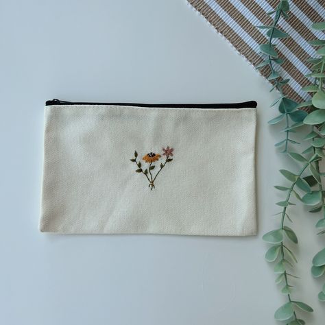 Hand Embroidered Sunflower Pouch, Pencil Case, Makeup Pouch, Hand Embroidery, Cute Gift, Cute Pouch, Graduation Gift, Bridesmaid Gifts https://etsy.me/43nfG5r #beige #sunflower #minimalist #cuteflowers Embroidery Pencil Case, Sunflower Minimalist, Floral Pouch, Bag Drawing, Embroidery Cute, Cute Pouch, E Flowers, Drawing Bag, Christmas Post