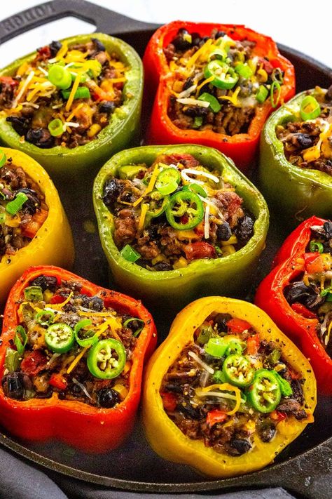 Stuffed peppers with ground beef, Mexican seasonings, spicy peppers, black beans, corn, and fire roasted tomatoes. Topped with cheese! #stuffedpeppers #lowcarb #bellpeppers Loaded Peppers, Roasted Stuffed Peppers, Stuffed Peppers With Ground Beef, Salt Beef, Stuffed Peppers Beef, Tomatoes Roasted, Ground Beef Keto Recipes, Homemade Beans, Stuffed Tomatoes