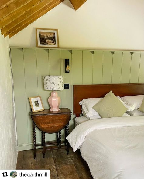 We're thrilled to see our custom-cut v-groove wall panelling and picture shelf bringing rustic charm to this cosy bedroom! The soft sage green complements the wooden beams beautifully, creating a serene retreat. Thanks to @thegarthmill for sharing this lovely space featuring our panelling. Bedroom Panelling Behind Bed, Paneling With Shelf, Bead Board Walls Bedroom, Paneling Sheets, Tongue And Groove Walls, Bead Board Walls, Picture Shelf, Bedroom 2024, Soft Sage Green