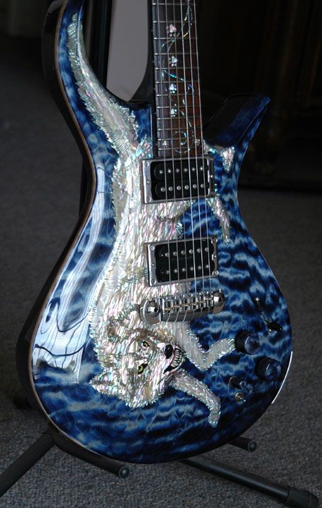 Wolf guitars Yolei Inoue, Cool Instruments, Guitar Inlay, Pretty Guitars, Guitar Designs, Instruments Art, Electric Guitar Design, Guitar Obsession, Custom Electric Guitars