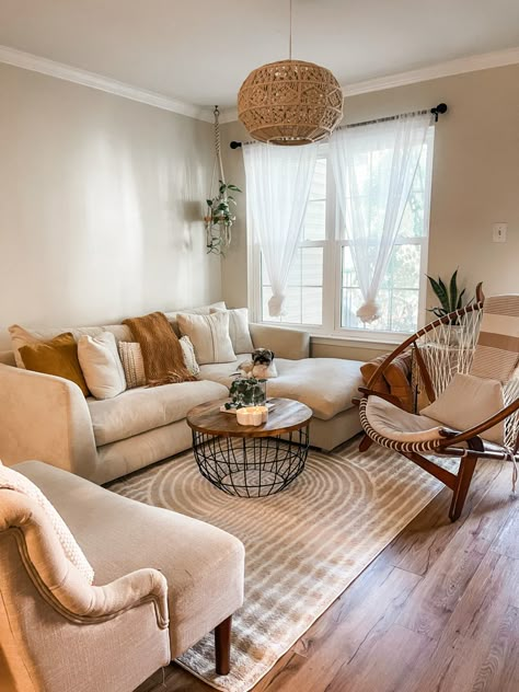 Tan Couch In Living Room, Farmhouse Living Room Neutral Colors, Cozy Neutral Boho Living Room, Neutral Home Decor Living Room Small Spaces, Cream Themed Living Room, Boho Airy Living Room, Cozy Neutral Living Room With Pop Of Color, Neutral Themed Living Room, Simplistic Boho Living Room