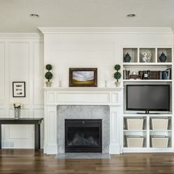 I am a girl that loves symmetry and there is one space in my home that is off balance in my mind. I knew the day we found out that ... Off Center Fireplace, Traditional Family Rooms, Built In Around Fireplace, Traditional Family Room, Fireplace Built Ins, Farmhouse Fireplace, Fireplace Remodel, Home Fireplace, Living Room Remodel