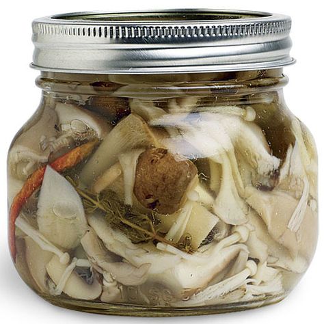 Pickled Mushrooms with Garlic and Herbs - Recipe - FineCooking Russian Christmas Traditions, Pickled Mushrooms Recipe, Pickled Mushrooms, Asparagus Pizza, Wild Mushroom Recipes, Potato Crisps, Herb Recipes, Fine Cooking, Party Dishes