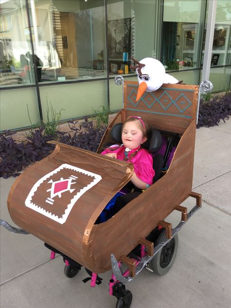 Frozen Princess Anna sleigh wheelchair costume Wheelchair Cosplay, Wheelchair Decorations, Stroller Costume, Olaf Halloween Costume, Anna Frozen Costume, Halloween Golf, Wheelchair Costumes, Frozen Costumes, Frozen Halloween