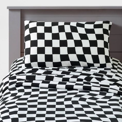 Elevate your bedroom space with this timeless yet modern checker printed Jersey Sheet Set. Featuring a classic black and white checkered print on a recycled polyester and cotton blend, these sheets offer a soft and sustainable option for your teen's bedding. Whether they're studying or sleeping, these jersey sheets promise cozy nights of rest and relaxation. 4-piece full and queen sets include a flat sheet, fitted sheet and two pillowcases; 3-piece twin set includes a flat sheet, fitted sheet an Retro Boys Room, Racing Bedroom, Grey Boys Rooms, Black And Grey Bedroom, Car Themed Bedrooms, White Kids Room, Boys Bedroom Makeover, Queen Size Sheets, Cars Room