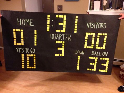 DiY scoreboard. Perfect for football themed party. Tar paper, chalk, foam sheets. Chalkboard Scoreboard Diy, Mvp Party Decorations, Diy Football Scoreboard Ideas, Diy Basketball Scoreboard, Football Scoreboard Diy, Halloween Football Theme, Diy Scoreboard Ideas, Diy Football Backdrop, Score Board Ideas