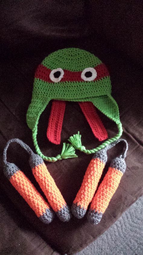 FO Ninja turtle hat and nunchucks for my nephew. Crochet Ninja Turtle Hat, Crochet Nunchucks, Turtle Patterns, Crochet Ninja Turtle, Ninja Turtle Hat, Crochet Baby Booties Tutorial, Crochet Kids Scarf, Turtle Hat, Crochet Hood