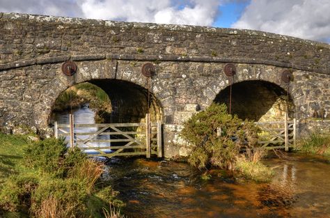 https://flic.kr/p/SDpjaK | Protecting young salmon on Dartmoor | Salmon breed in the Cherry Brook on Dartmoor and the gates across the Lower Cherrybrook Bridge near Two Bridges are to prevent canoeists from disturbing the fry amongst the gravel on the bed of the stream.  The Cherry Brook is a tributary of the West Dart River. It rises north of Lower White Tor in the open moorland and flows in a generally southerly direction,  winding its way down to meet the West Dart River about a mile sout... Ancient Stone, Listed Building, Way Down, Dart, Bridge, Cherry, Natural Landmarks, Stone, Building