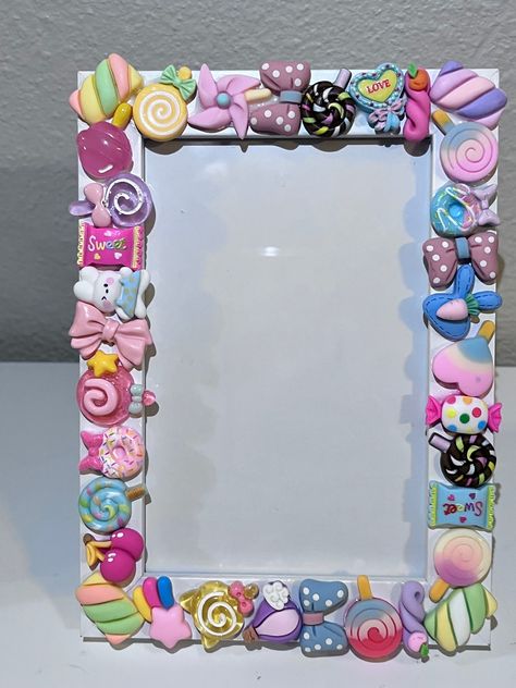 This is a sweet candy Picture frame. I have completely covered the front in all types of different embellishment charm candies and it couldn't have came out cuter!!  I will offer this in black or white frame and different size variations!  4x6 frame pictured Diy Crafts Easy At Home, Candy Pictures, Photo Frame Crafts, Charms Candy, Girly Frame, Bee Creative, Beaded Pens, Mini Frames, Crafts With Pictures