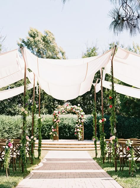 shade canopy wedding ceremony and floral arbor Back Garden Wedding Ceremony, Canopy Wedding Ceremony, Floral Canopy Wedding, Shade For Wedding, Event Canopy, Outdoor Wedding Ceremony Shade, Canopy For Wedding Ceremony, Wedding Ceremony Canopy, Rose Garden Wedding Ceremony