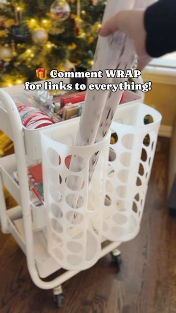 Laurie on Instagram: "Christmas Wrapping Station 😍🎁 Comment WRAP for links to everything I used in this fun + easy DIY! Keep it all organized so you can wrap up the love this Christmas! 🎄" Christmas Wrapping Storage, Christmas Wrapping Station Ideas, Wrapping Paper Cart, Christmas Wrapping Station, Diy Wrapping Paper Storage, Wrapping Paper Organization, Wrapping Paper Storage, Gift Wrapping Station, Wrapping Station