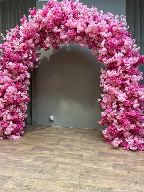 This listing is for a LUXE pink cherry blossom flower arch, one of a kind.  This beauty is 3D and the flowers can be seen on all sides. If you purchase this listing you will receive the frame as well as the flowers. The flowers have been permanently set into the frame basically.  This arch is made out of a mix of pink and blush cherry blossom. **KEY FEATURES - Impressive Size: Measures 2.2m x 2.2m - Easy Transportation: Dismantles into 4 pieces for convenient transportation - Sturdy Construction Pink Flower Arch, Cherry Blossom Arch, Wedding Flower Arch, Quinceanera Pink, Flower Backdrop Wedding, Cherry Blossom Flower, 21st Birthday Decorations, Flower Arch, Cherry Flower