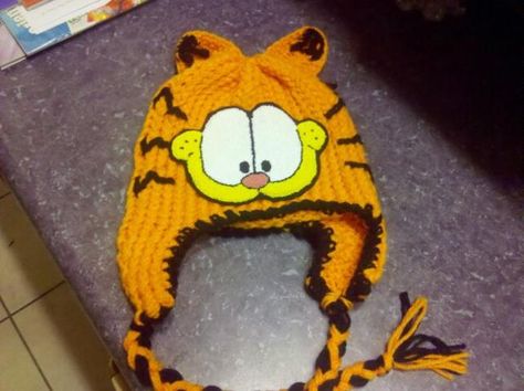 Garfield. Someone pretty please make me this hat!!!!!!!! Garfield Matching Pfp Cat, Crochet Garfield Hat, Garfield Hat, Garfield Cowboy Hat, Garfield Crochet Hat, Garfield Sweater, Garfield Accessories, Garfield Jacket, Garfield Clothes