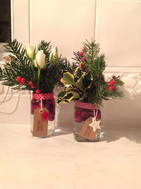 My Christmas posies Christmas Mason Jar Flower Arrangements, Christmas Jam Jar Decorations, Jam Jar Crafts, Christmas Treats Jars, Christmas Fayre Ideas, Jam Jar Flowers, Christmas Bouquets, Mason Jar Flower Arrangements, Flower Stall