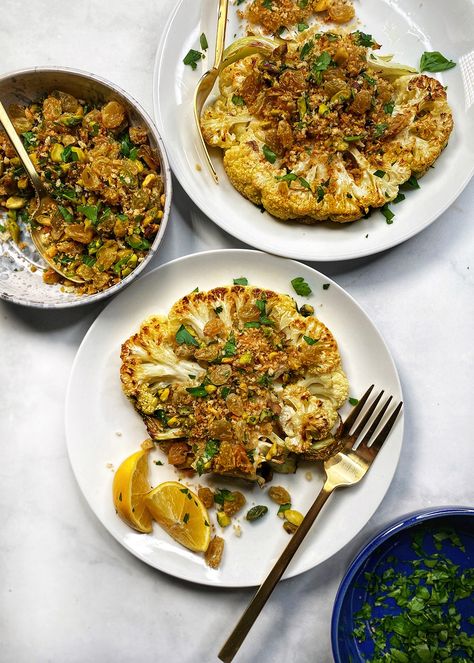 Cauliflower Steaks with Golden Raisins and Pistachios - The Delicious Life Charred Broccoli, Side Dishes For Salmon, Roasted Cauliflower Steaks, Raisin Recipes, Flavorful Vegetables, Broccoli Recipe, Cauliflower Steaks, Meatless Dinner, Golden Raisins