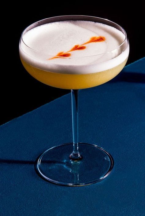 The Artesano Pisco Sour is a foamy, pleasantly earthy cocktail that calls for pisco, lime juice, an egg white, and gum syrup. Garnish your Artesano Pisco Sour with a few drops of bitters. Space Reference, Grape Brandy, Peruvian Cuisine, Food Photoshoot, Pisco Sour, Sour Cocktail, Whiskey Sour, Easy Cocktails, Alcohol Drink Recipes