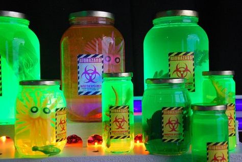 Alien Specimen Jars. Worked great with a highlighter filter as the color agent! | Halloween Forum Alien Centerpieces, Specimen Jars, Alien Birthday Party, Glow Stick Jars, Glow Jars, Alien Party, Alien Halloween, Halloween Forum, Themes Ideas