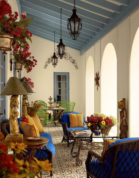 Brilliant blues and bold yellows are coupled with a relaxing ambiance inside this Mediterranean porch Modern Mediterranean Decor, Mediterranean Patio, Spanish Decor, Mexican Home, Mediterranean Home Decor, Spanish Style Home, Casas Coloniales, Mediterranean Decor, Spanish Style Homes