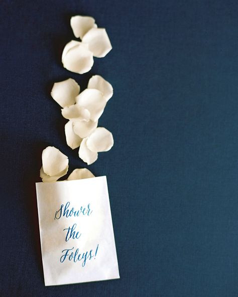 At the end of this wedding ceremony, guests tossed white rose petals at the newlyweds. The petals were stashed in paper bags stamped with "Shower the Foleys" in the same calligraphy style as their invites. Beautiful Lilies, Lilies Wedding, White Rose Petals, Wedding Throw, Petal Toss, Wedding Toss, Love Bells, Wedding Exit, Wedding Exits